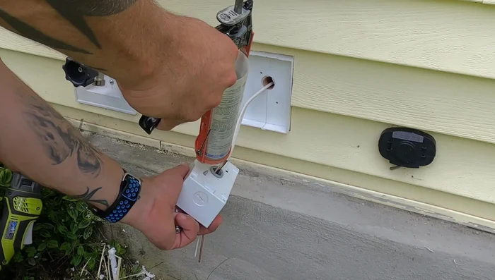 Connect the wires to the GFCI receptacle (line and load sides). Black wire goes to the brass terminal, white to the silver terminal, and green/bare copper to the ground screw. 