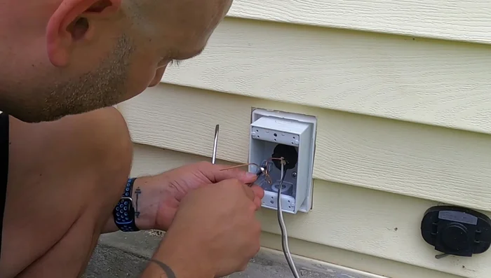Connect the wires to the GFCI receptacle (line and load sides). Black wire goes to the brass terminal, white to the silver terminal, and green/bare copper to the ground screw. 