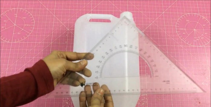 Measure the gallon's circumference (22 inches) and depth (3.5 inches + 1.5 inches extra).