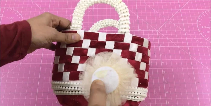 Measure the basket's volume. Use a fabric shopping bag of similar size, cutting it to fit above the basket's top. Glue the edges and insert into the basket, gluing the ends.