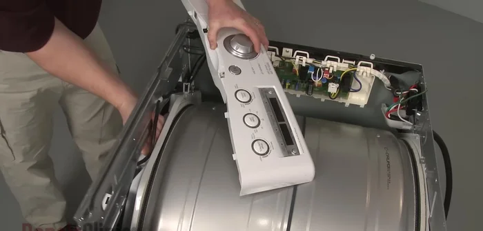 Align the main top on the cabinet, push it forward, and secure the screws. Plug in the power cord and confirm proper functioning.