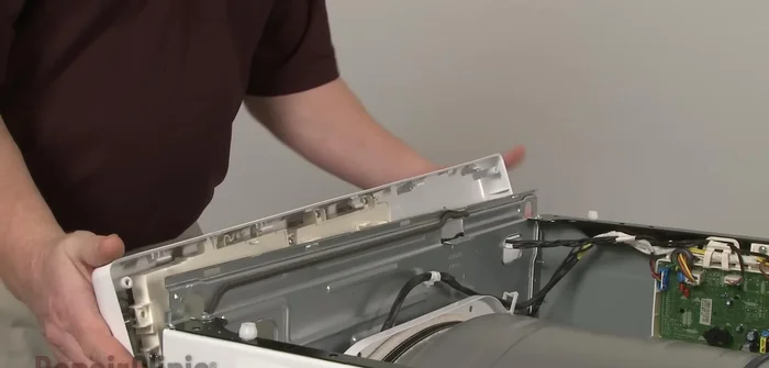 Align the main top on the cabinet, push it forward, and secure the screws. Plug in the power cord and confirm proper functioning.