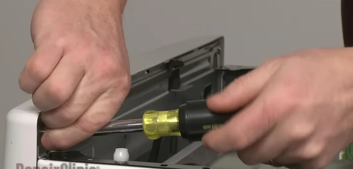 Detach the door switch wire harness.