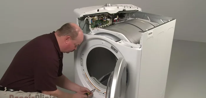 Remove the screws securing the duct housing to the blower assembly. Lift the front bulkhead up and pull it forward to remove.