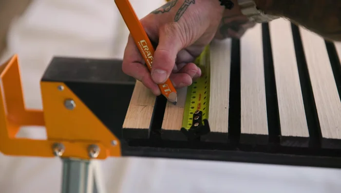 Remove masking tape and clean off any residue. Sand edges with 120-150 grit sandpaper for a smooth finish.