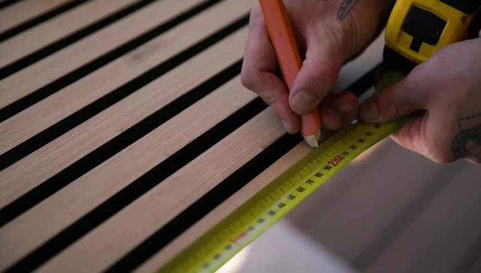 Remove masking tape and clean off any residue. Sand edges with 120-150 grit sandpaper for a smooth finish.