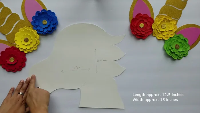 Stitch two pieces of white felt together, leaving a 4-inch gap for stuffing.