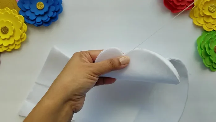 Stitch two pieces of white felt together, leaving a 4-inch gap for stuffing.