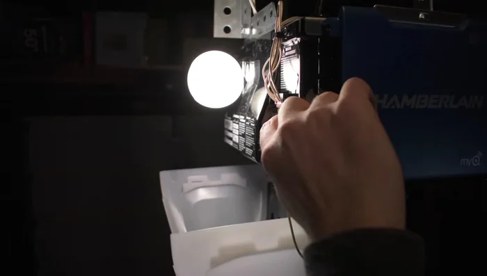 Repeat the process for closing the garage door using the up arrow. Test the up and down buttons to ensure the door stops where programmed.