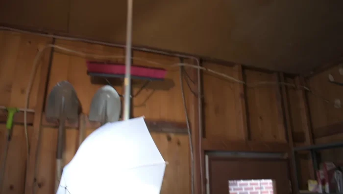 Route the new wiring from the garage door opener to the garage door using staples.