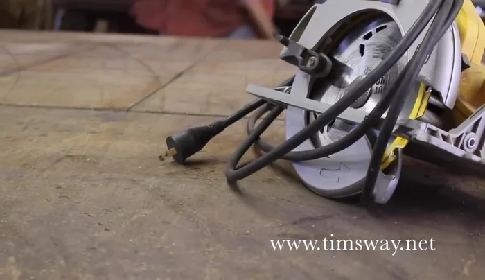 Prepare the reclaimed wood: Select and prepare reclaimed wood planks, keeping as much of the natural patina as possible.