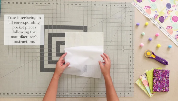 Attach pocket linings: Place pocket pieces wrong side up, line up lining, fold, press, and top stitch.