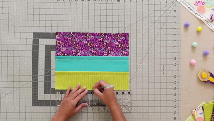 Prepare pockets 7, 8, and 9: Mark vertical lines and stitch.