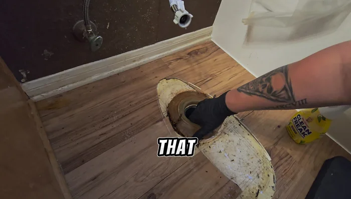 Remove any flooring that will interfere with the installation of the new wax ring.