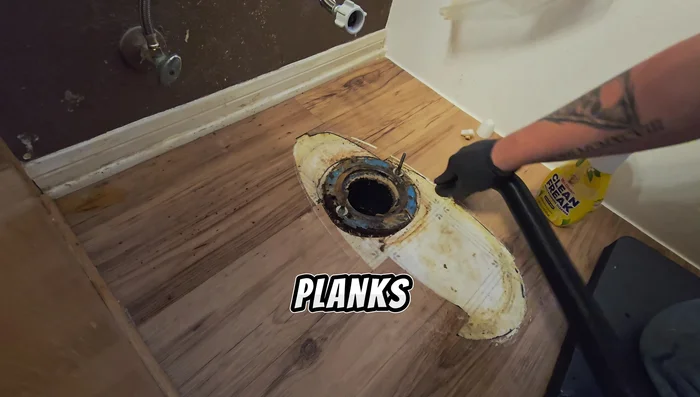 Remove any flooring that will interfere with the installation of the new wax ring.