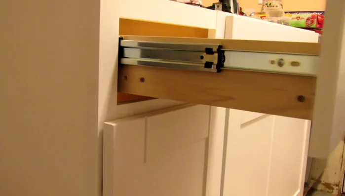 Test the new drawer slides. Ensure smooth operation and full extension.