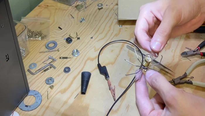 Attach the abdomen using super glue and a sliver of metal to strengthen the bond.