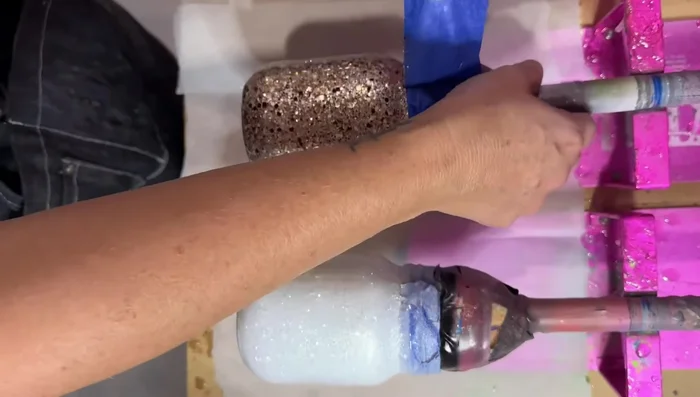 Remove painter's tape: Carefully remove the painter's tape before it dries and sticks permanently.