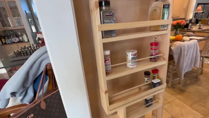 Add dowel pins and risers: Add dowel pins and risers to create adjustable shelves for various spice container sizes.