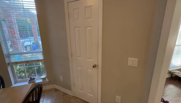 Plan and template: Create a template using painter's tape on the pantry door to visualize the spice rack's size and placement.