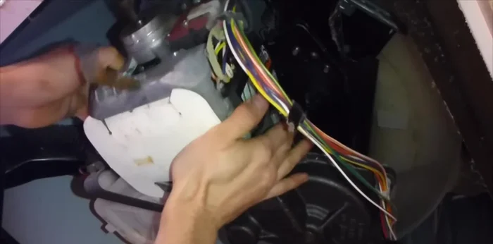 Remove the motor assembly; it's heavy, so be careful.