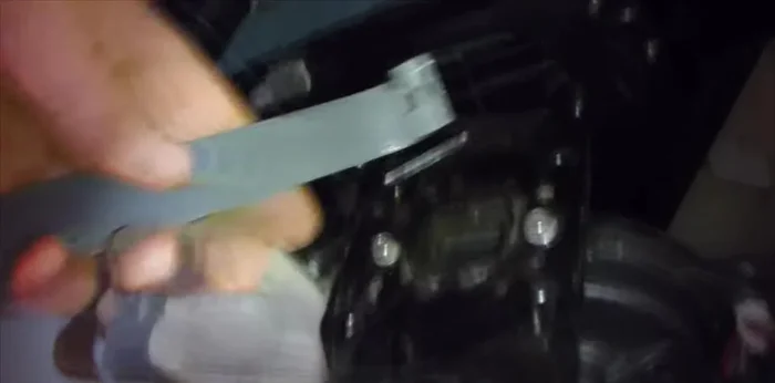 Reinstall the motor, aligning the pegs on the coupler with the corresponding holes on the motor shaft. Secure it with the two clips and bolts.