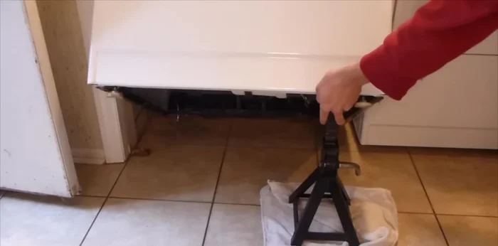 Unplug the washing machine and consider shutting off the water supply.