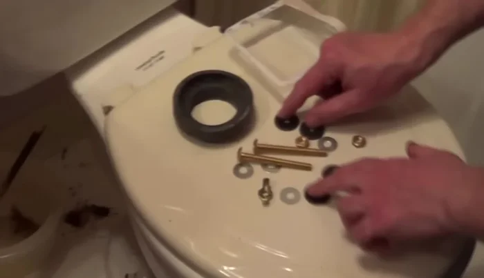 Remove the tank from the bowl.