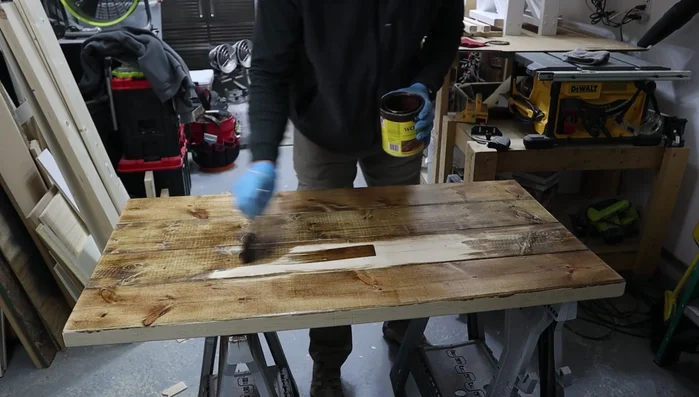 Apply stain to the table top.