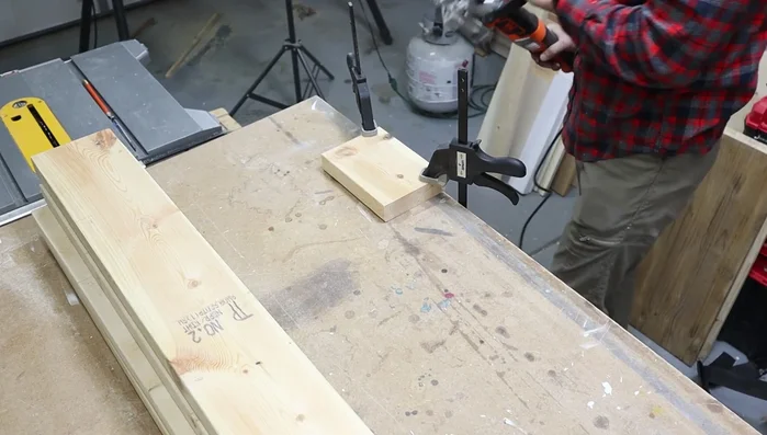 Cut biscuit slots using a biscuit jointer, following the marked lines.