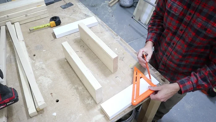 Cut and attach the X-shaped cross supports.