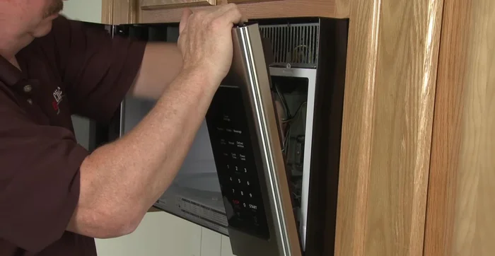 Align the assembly and push down. Thread the screw (a magnetized screwdriver is recommended).