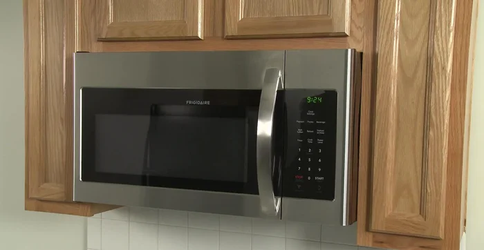 Open the microwave door.