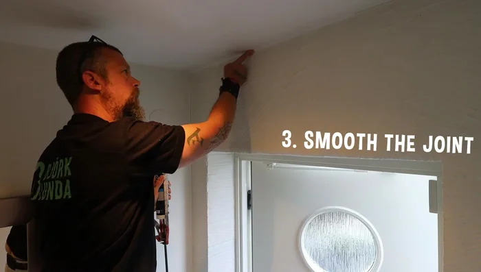 Smooth the caulk using your fingers (dampen them with warm water if needed).