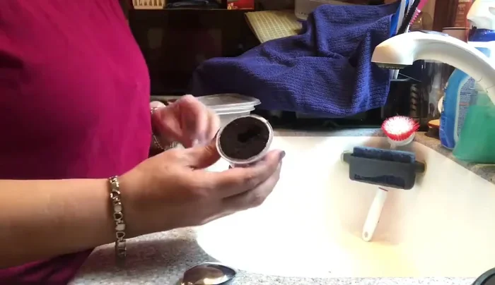 Tear off the filter at the bottom of each K-cup. Start from a corner for easier removal.