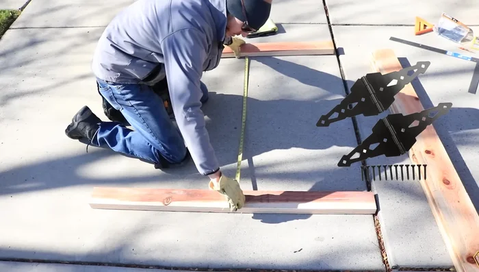 Square up the rails using diagonal measurements. Temporarily screw them to a workbench for stability if possible.