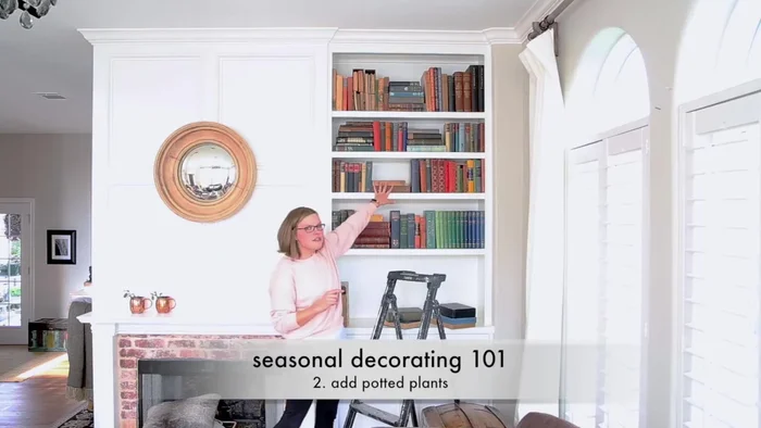 Add plants: Include plants, real or artificial, to bring life and vibrancy to the space. Strategically place them to enhance the visual appeal.