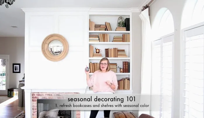 Clear and plan: Remove all decorative items and books from the bookcase. Consider the desired color scheme and overall style for the spring season (e.g., lighter colors, blues and greens).