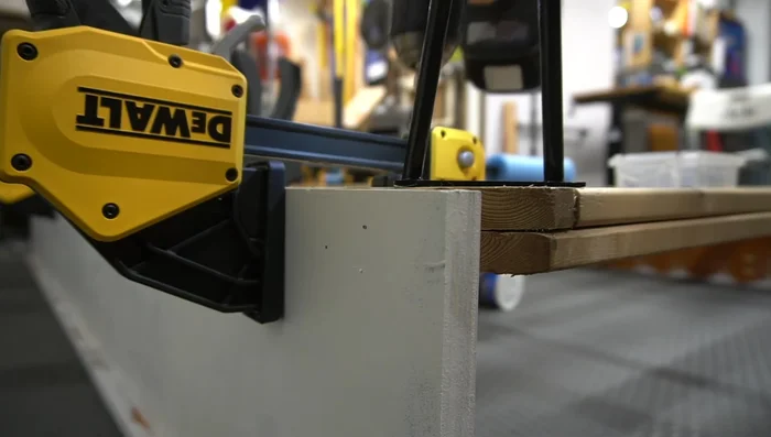 Attach legs and paint: Attach hairpin legs to the corners. Paint the frame (black in this example).