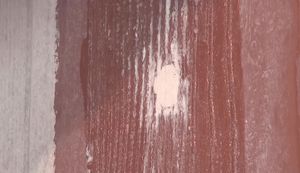 Patching Holes on Uneven Surfaces: A Two-Coat Method