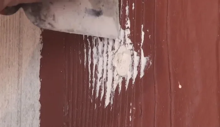 Allow the first coat to dry completely.