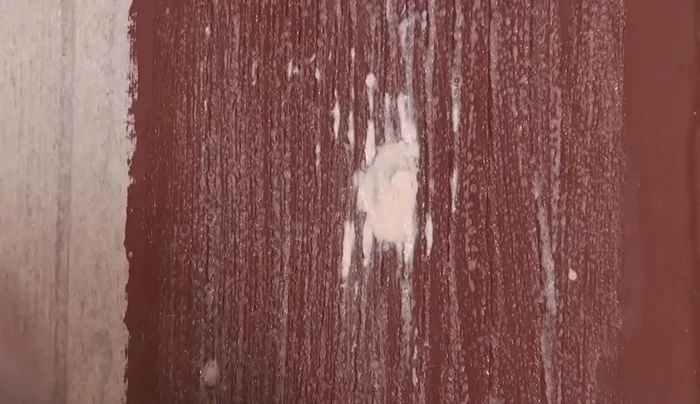 Allow the first coat to dry completely.