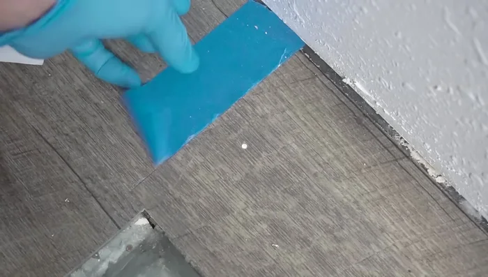 Use a soldering iron and LVP shavings to melt and fill any remaining gaps or imperfections, feathering the edges for a seamless finish.