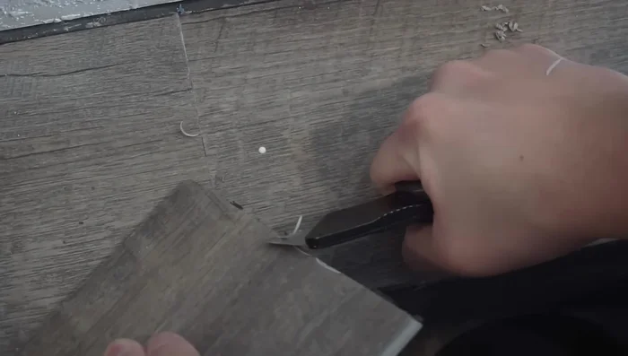 Use a soldering iron and LVP shavings to melt and fill any remaining gaps or imperfections, feathering the edges for a seamless finish.