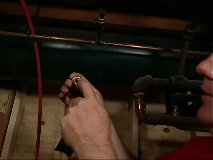 Run the PEX tubing inside, securing it with one-nail clips (Talents).