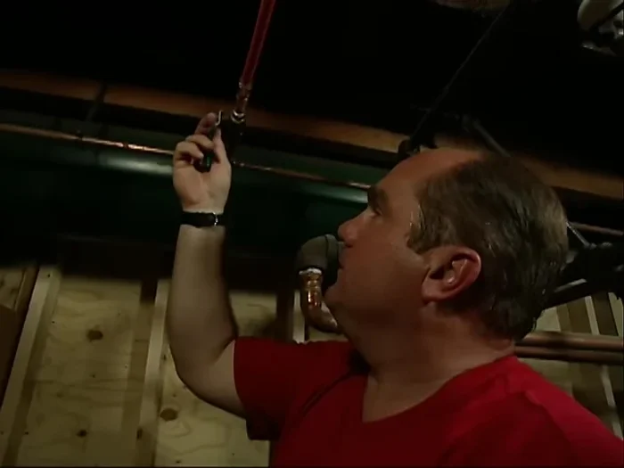 Attach the handle back to the valve and test the connection.