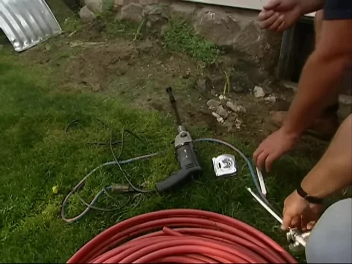 Connect the PEX tubing to the outdoor sillcock using Teflon tape, a transition fitting, and two wrenches to ensure a watertight connection.