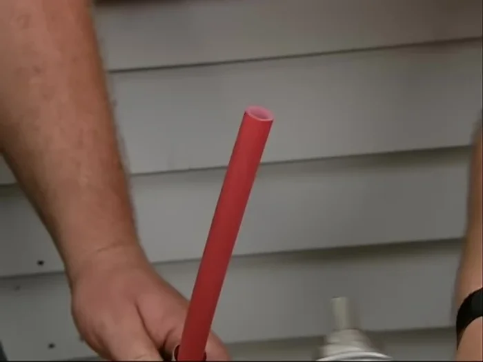 Use a PEX expansion tool to expand the PEX pipe and connect it to the fitting. Apply caulk for a watertight seal. Secure with stainless steel screws.