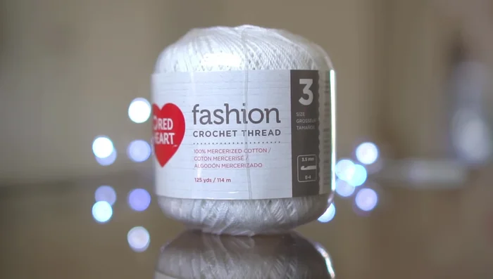 Weave the trellis: Using 100% cotton thread, weave the frame to create the trellis.