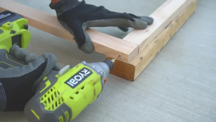 Assemble the frame: Arrange the cut pieces into a square frame. Predrill pilot holes to prevent splitting, then join the pieces with screws, adding braces for extra strength.